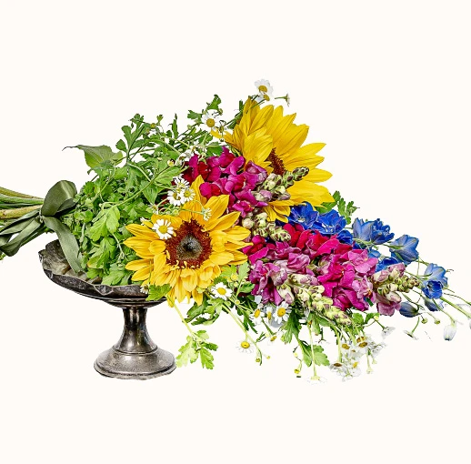 A colourful arrangement of fresh flowers welcoming new customers