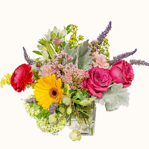 'Cascading Summer' flowers in a small vase
