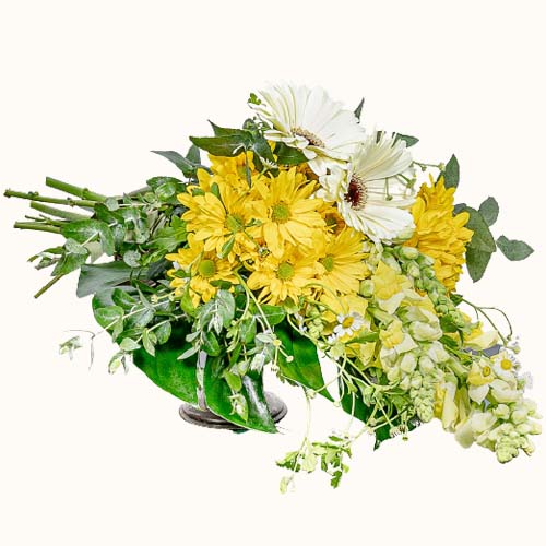 Yellow and white 'Sunday Spritz' flowers in a small vase