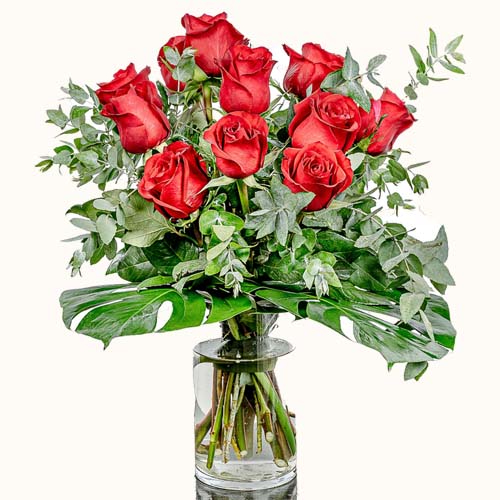 'The Red Queen' flowers in a small vase